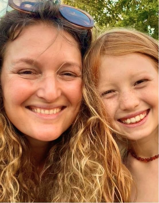 Sammy and Joyaa smiling together outdoors